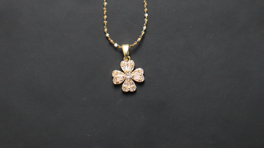 Crystal bow pendant necklace with gold-tone chain by SHUKR